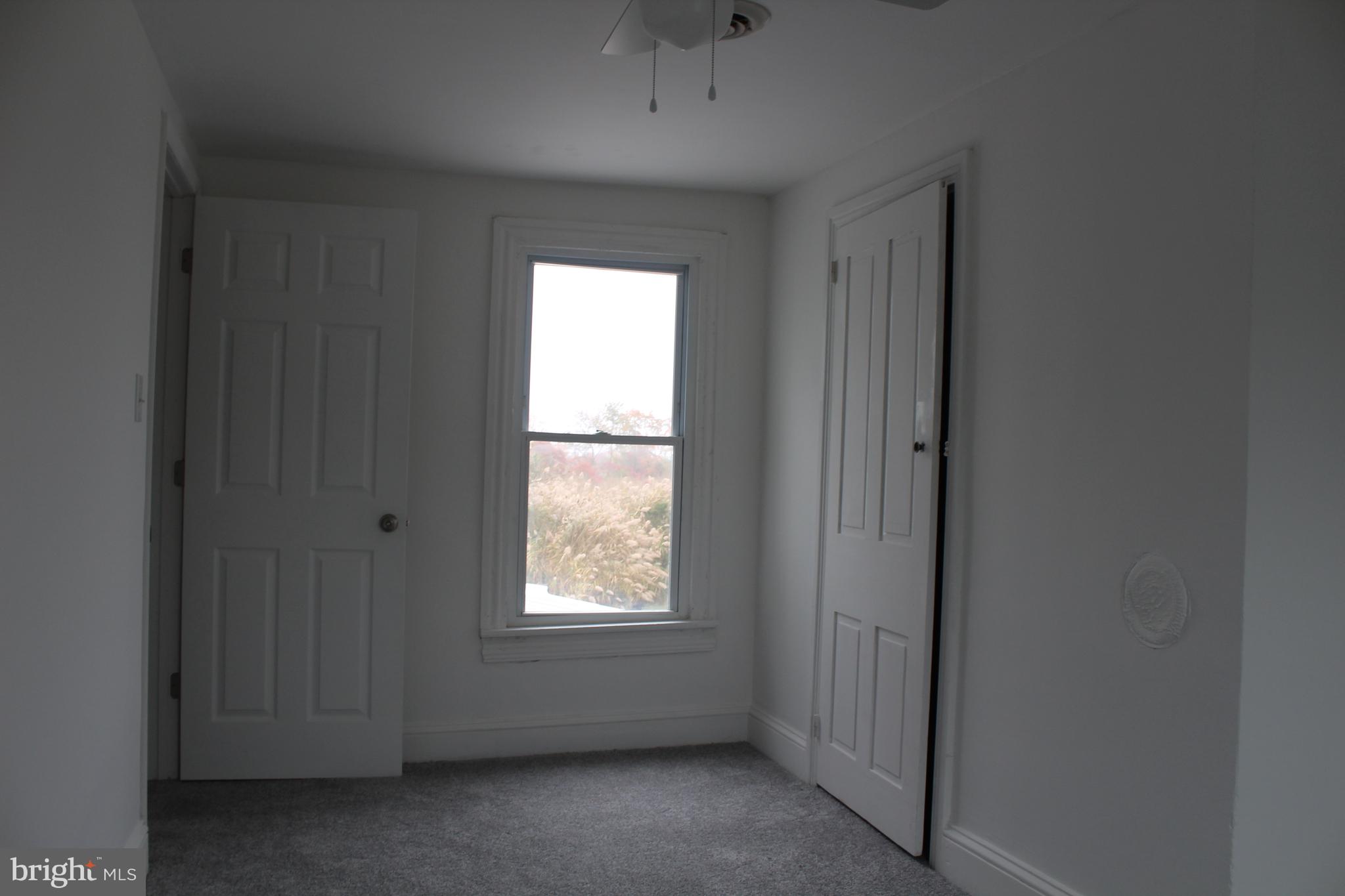 150 Main Street Dover, DE 19901 - Photo 31 of 50 a view of an empty room with a window