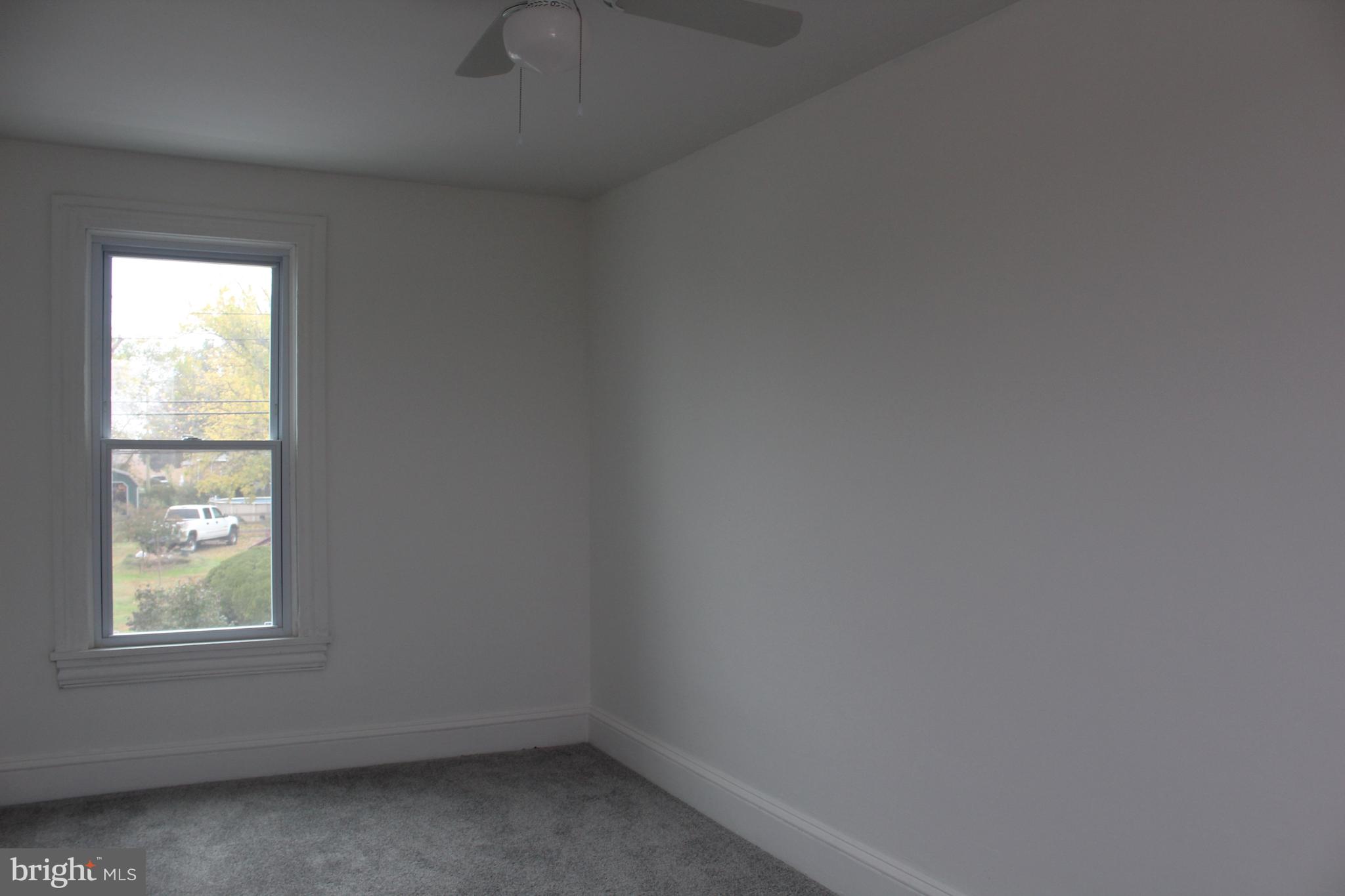 150 Main Street Dover, DE 19901 - Photo 33 of 50 an empty room with a window