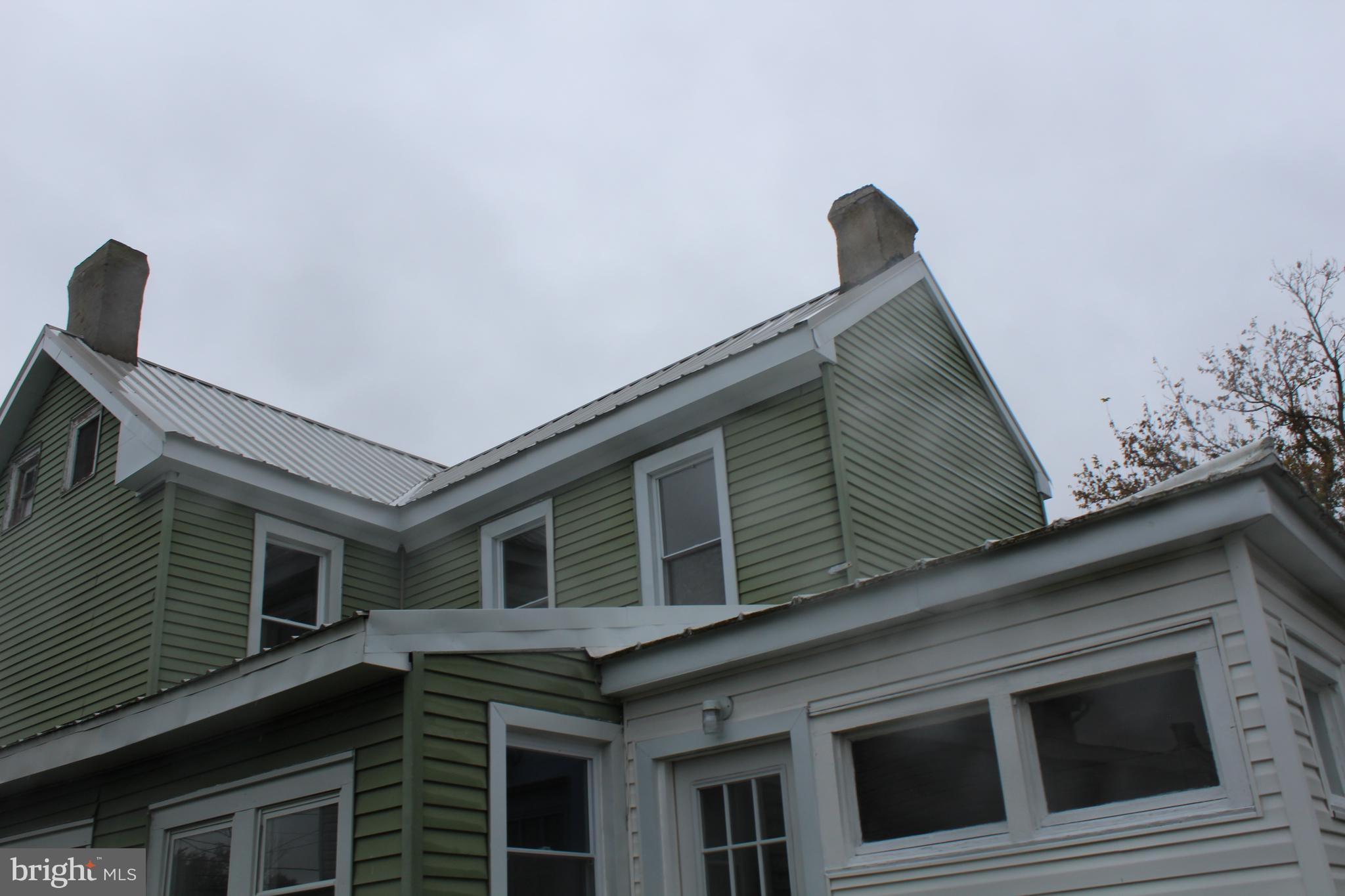 150 Main Street Dover, DE 19901 - Photo 47 of 50 a front view of a house with garage