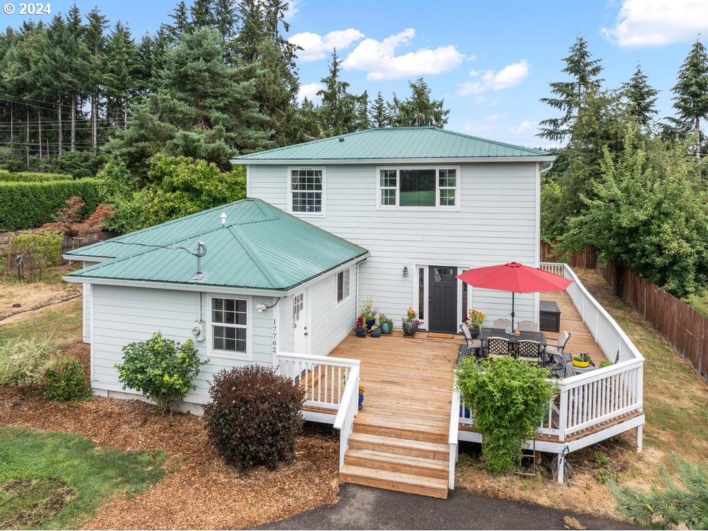 17762 South Redland Road Oregon City, OR 97045 - Photo 1 of 37 a view of a house with backyard and sitting area