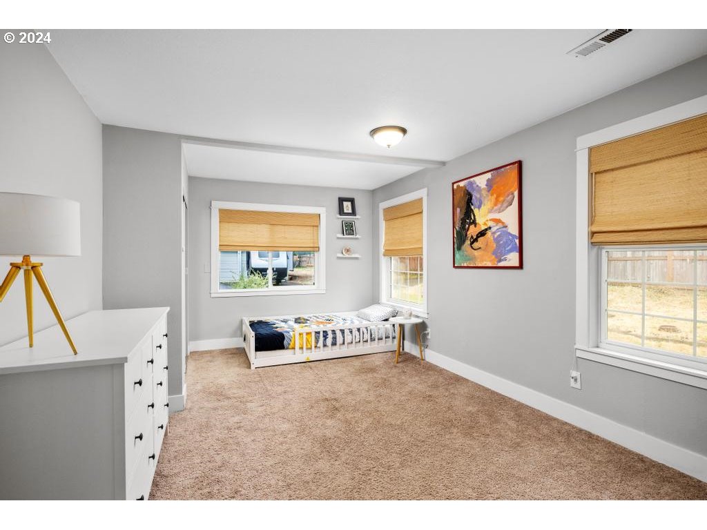 17762 South Redland Road Oregon City, OR 97045 - Photo 15 of 37 a living room with furniture and a flat screen tv