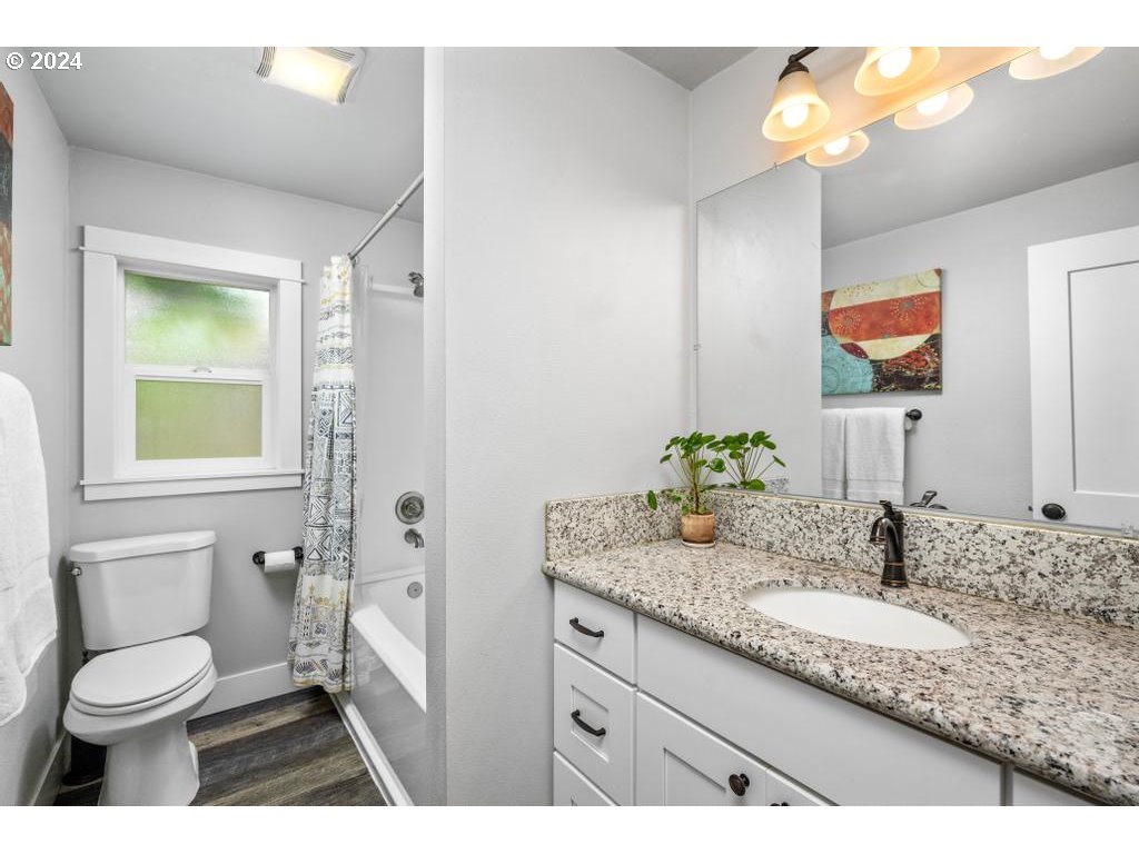 17762 South Redland Road Oregon City, OR 97045 - Photo 17 of 37 a bathroom with a granite countertop sink toilet and shower