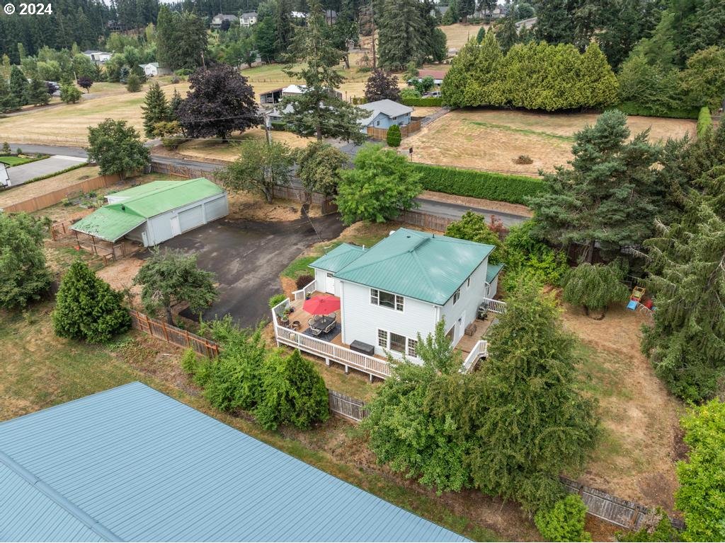 17762 South Redland Road Oregon City, OR 97045 - Photo 31 of 37 an aerial view of a house with a yard and lake view