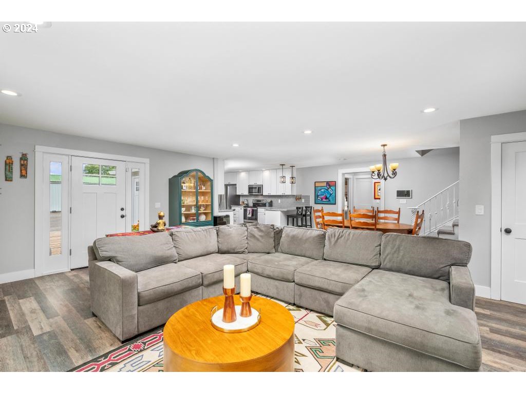 17762 South Redland Road Oregon City, OR 97045 - Photo 6 of 37 a living room with furniture and a couch
