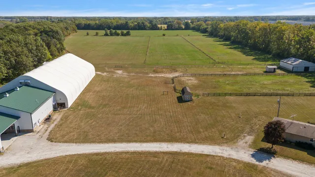 a backyard of a house with lots of green space