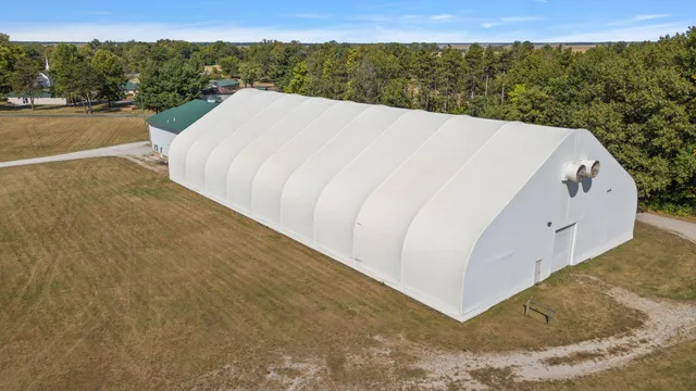 a group of people sitting at tables in a room