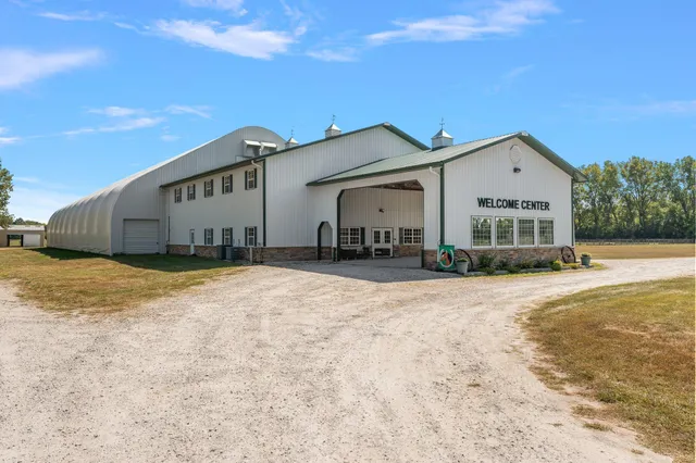 a open kitchen with stainless steel appliances granite countertop a sink and cabinets