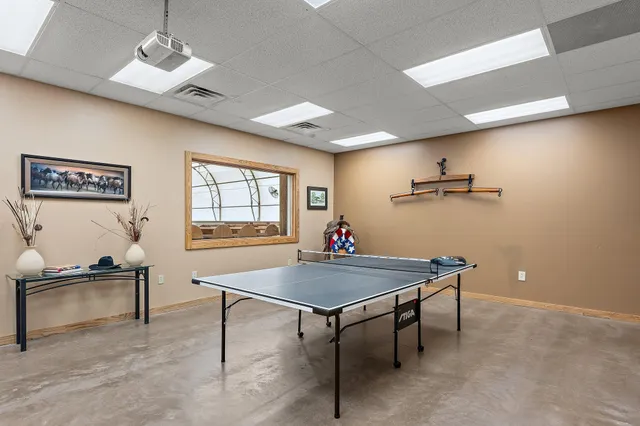 an aerial view of a house with outdoor space
