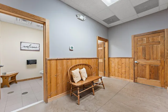 a living room with lots of furniture and appliances