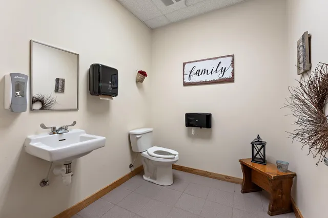 a bedroom with bed and window