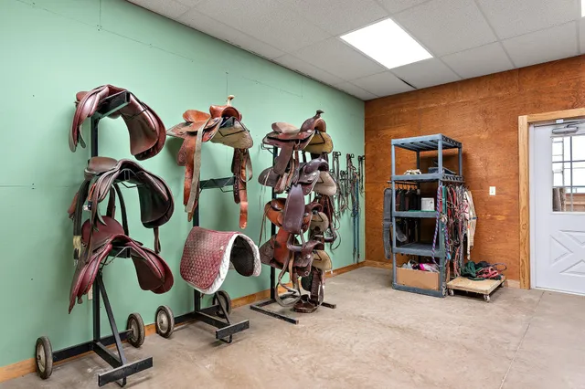 a bedroom with furniture and a window