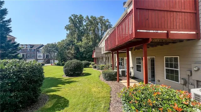 a view of a swimming pool with a lounge chairs