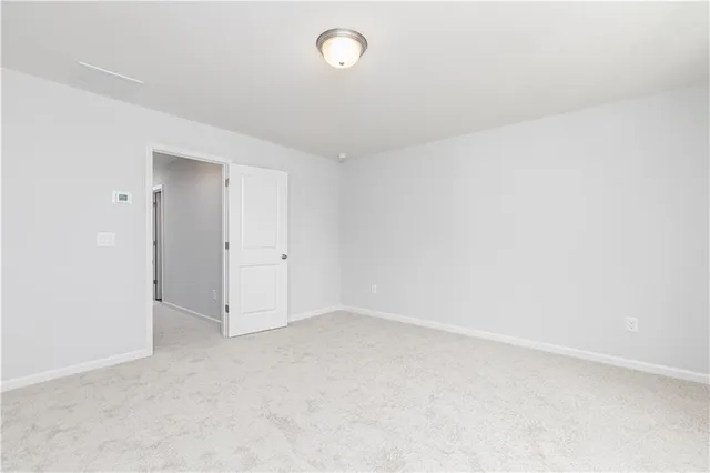 a bathroom with double vanity sinks and a large mirror