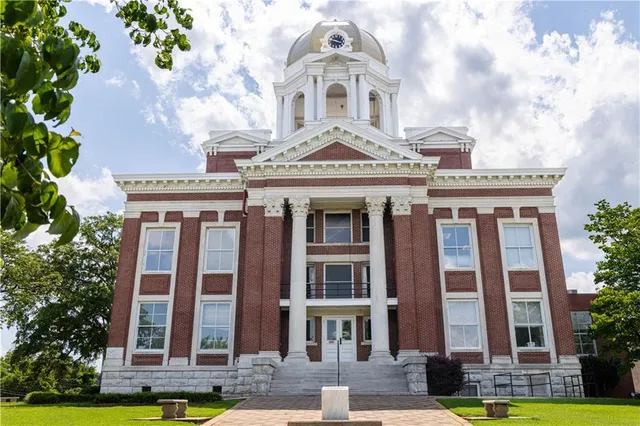 a view of a building with a street