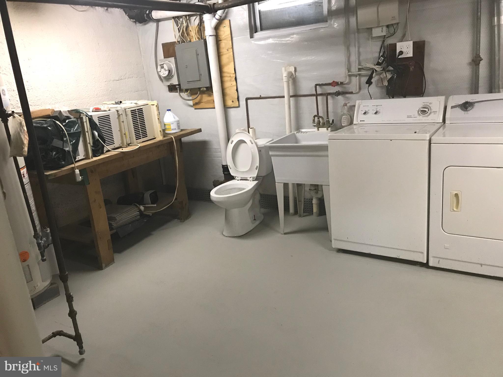 702 Devonshire Road Baltimore, MD 21229 - Photo 21 of 24 laundry/storage area