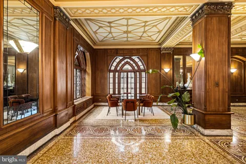 a living room with large windows