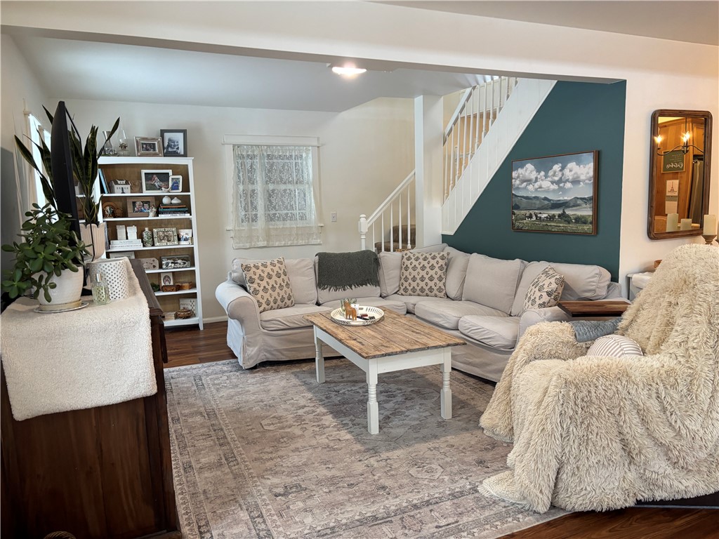 332 Upper Dutch Hill Road Oneonta, NY 13820 - Photo 19 of 50 Living room with stairs to the loft area