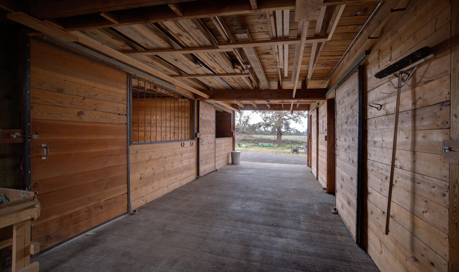 22245 Erickson Road Bend, OR 97701 - Photo 81 of 83 Barn interior with stalls