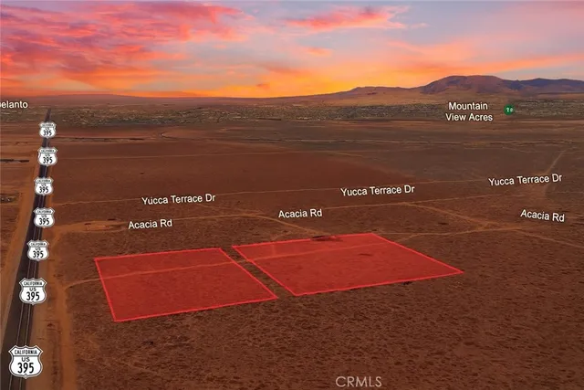a view of an ocean beach and mountain