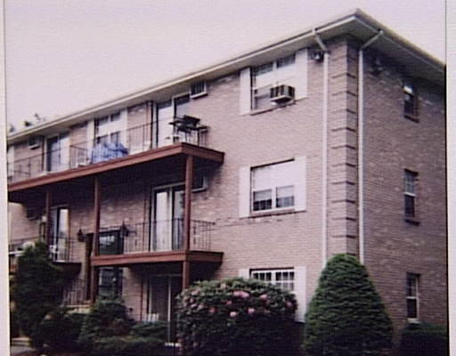 3 Kenmar Drive, Unit 3 Billerica, MA 01821 - Photo 1 of 1 a front view of a house with balcony
