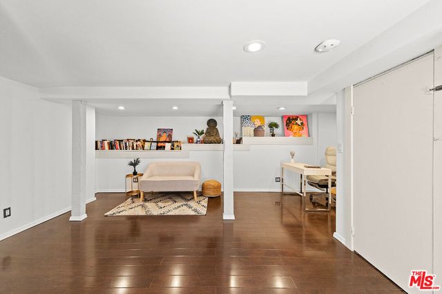 a view of a wooden door and a bench