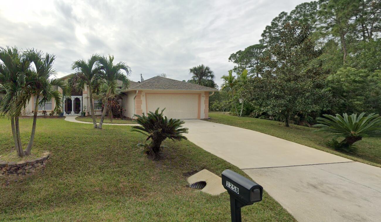1258 Whitehurst Road Southwest Palm Bay, FL 32908 - Photo 1 of 69 Front of house