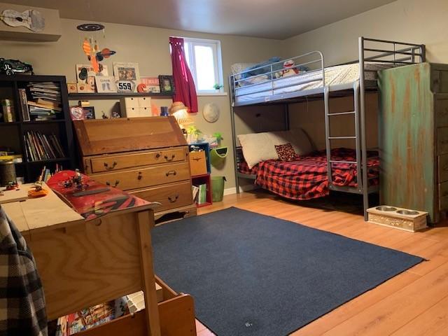 22810 Nelson Road Bend, OR 97701 - Photo 13 of 43 a bed room with a bed and a window