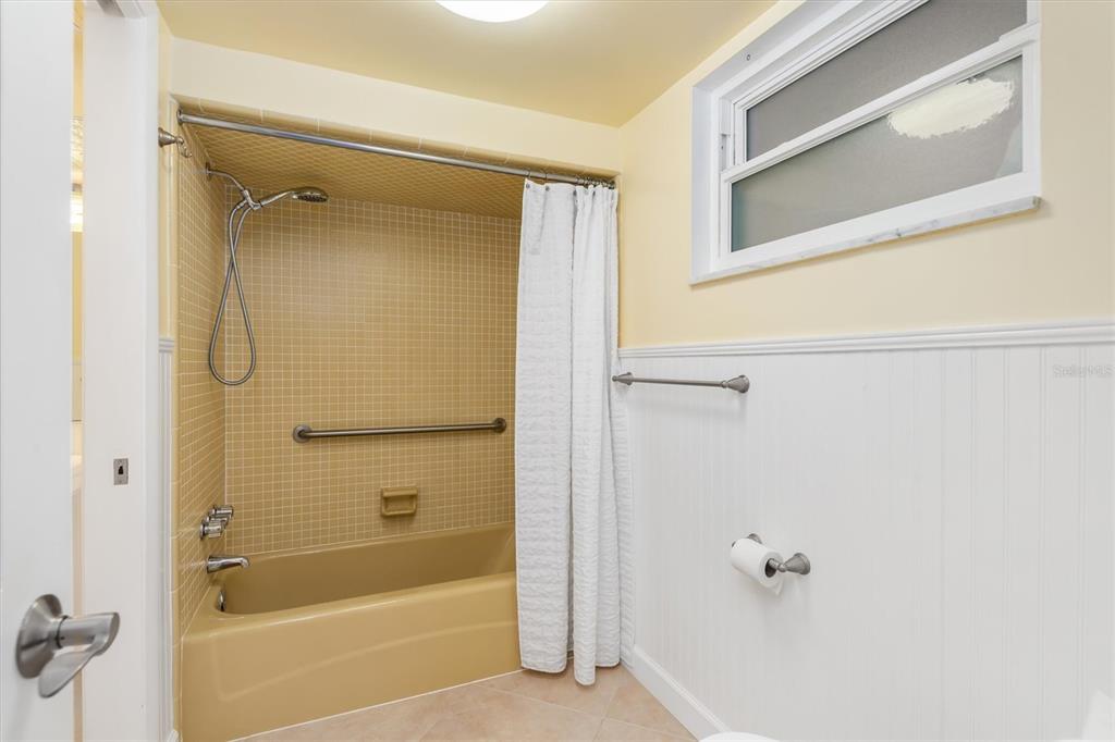 1 Colony Point Drive, Unit A8 Punta Gorda, FL 33950 - Photo 29 of 62 a bathroom with a bathtub