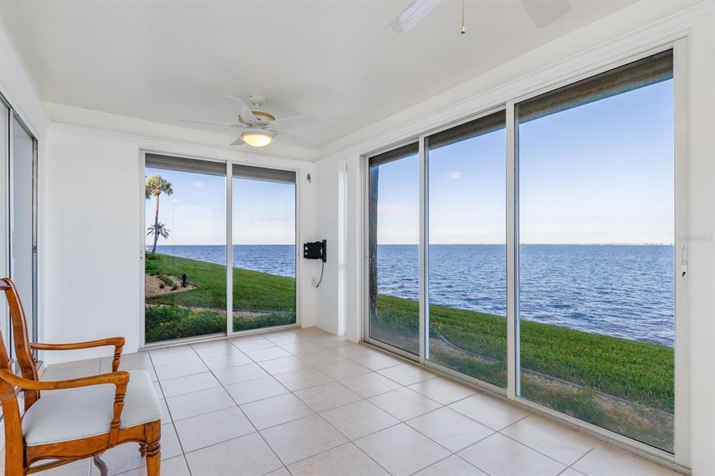 1 Colony Point Drive, Unit A8 Punta Gorda, FL 33950 - Photo 3 of 62 a view of an empty room with windows