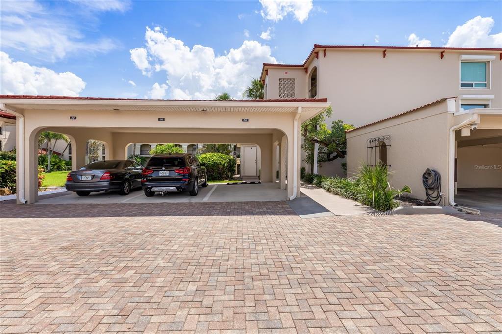 1 Colony Point Drive, Unit A8 Punta Gorda, FL 33950 - Photo 36 of 62 a view of a car parked in front of a building