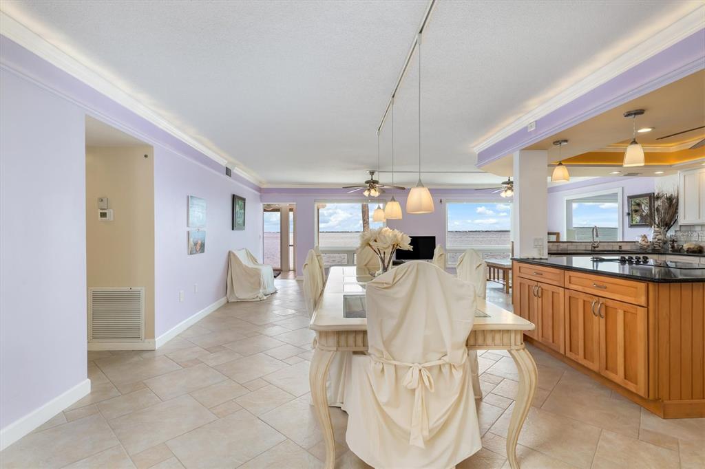 1 Colony Point Drive, Unit A8 Punta Gorda, FL 33950 - Photo 5 of 62 a large white kitchen with a large window