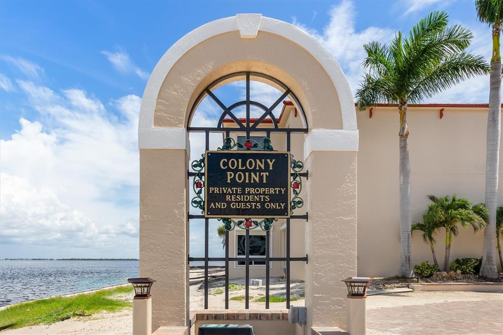 1 Colony Point Drive, Unit A8 Punta Gorda, FL 33950 - Photo 54 of 62 a view of entrance gate of a house with garden
