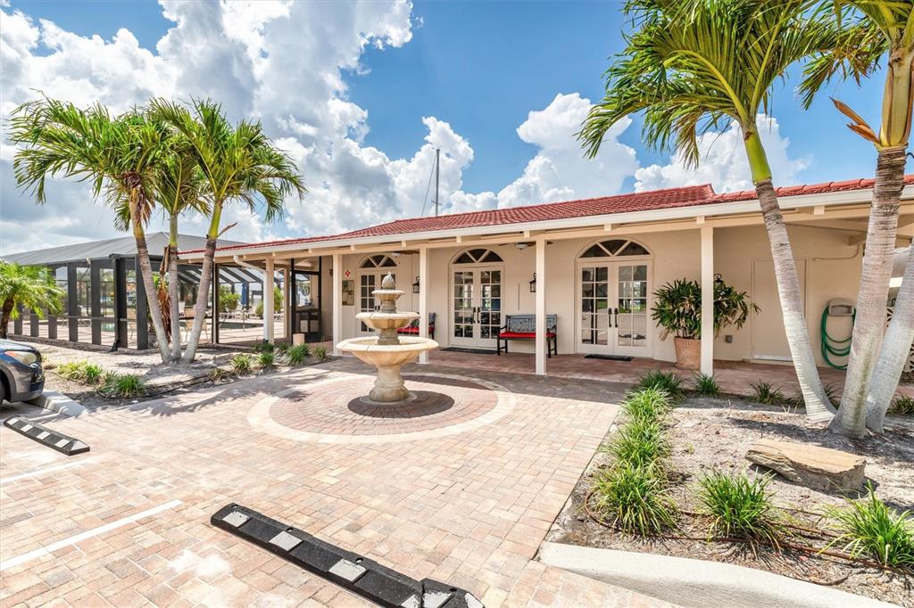 1 Colony Point Drive, Unit A8 Punta Gorda, FL 33950 - Photo 55 of 62 a view of a house with backyard porch and sitting area