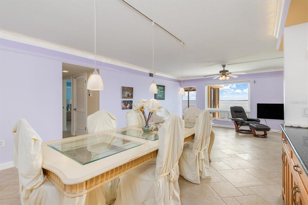 1 Colony Point Drive, Unit A8 Punta Gorda, FL 33950 - Photo 7 of 62 a view of a livingroom with a table and chairs