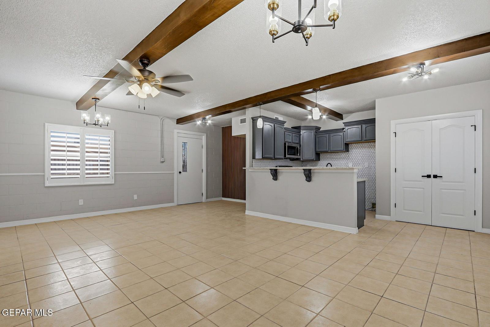 366 Riverside Drive Sunland Park, NM 88063 - Photo 19 of 34 a view of a kitchen with furniture and windows