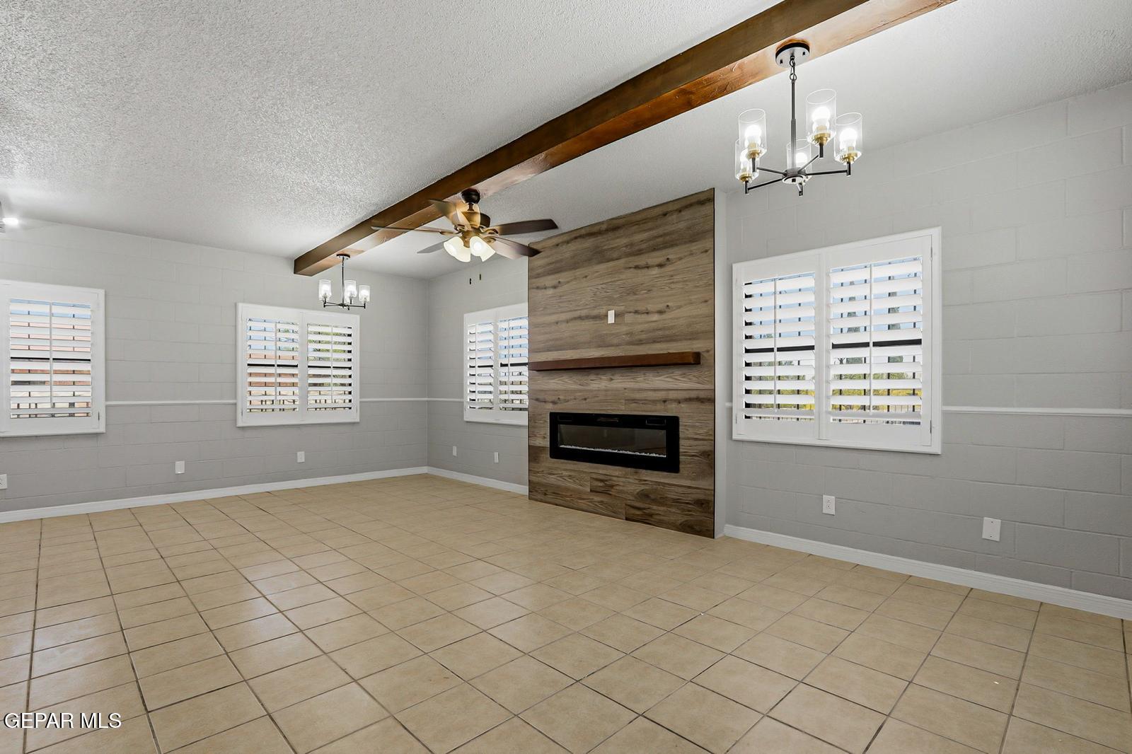 366 Riverside Drive Sunland Park, NM 88063 - Photo 4 of 34 a view of an empty room with a window