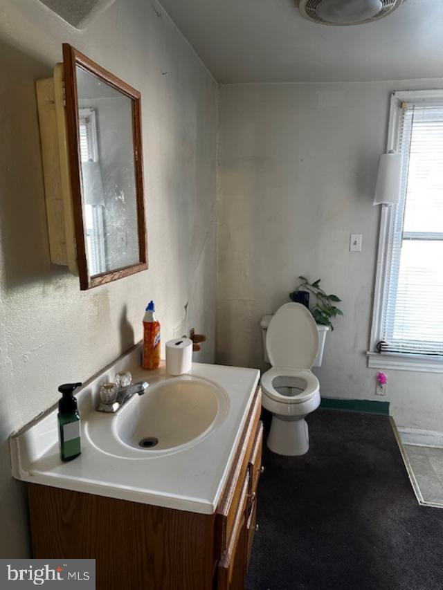 335 Chestnut Street Pottstown, PA 19464 - Photo 17 of 32 a bathroom with a sink and a toilet