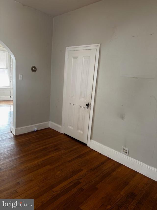 335 Chestnut Street Pottstown, PA 19464 - Photo 26 of 32 a view of an empty room with wooden floor and a window