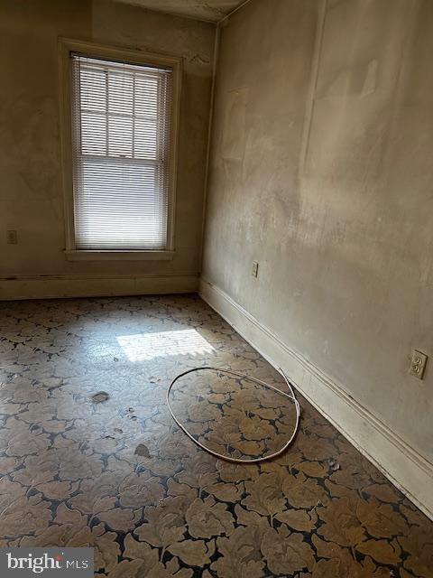 335 Chestnut Street Pottstown, PA 19464 - Photo 5 of 32 an empty room with a empty space and window