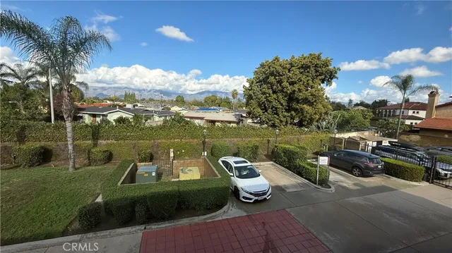 a bathroom with a sink and mirror with toilet
