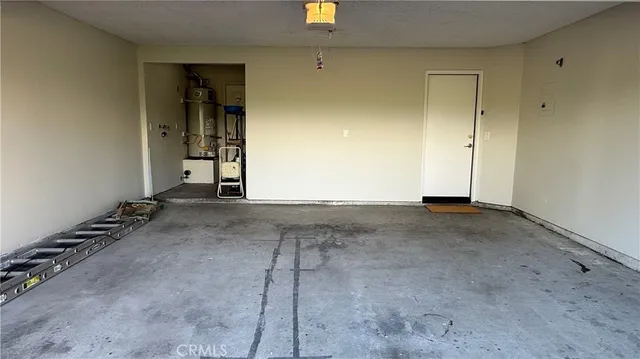 a view of a pathway of a house with a yard