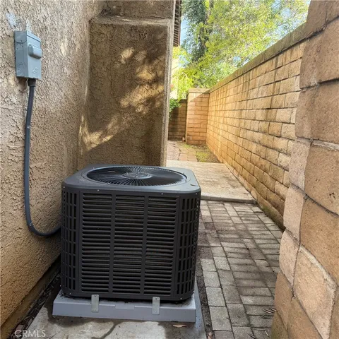 a view of a car park in front of a building