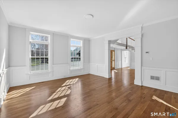 a bathroom with a sink mirror and toilet