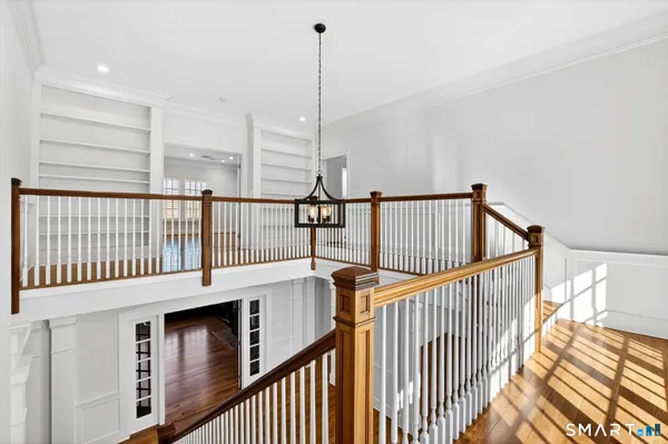 a bathroom with a granite countertop tub shower and mirror