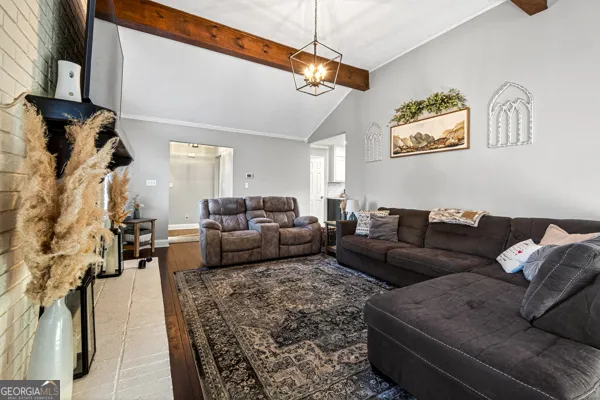 a living room with furniture and a couch