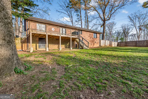 a big yard with large trees