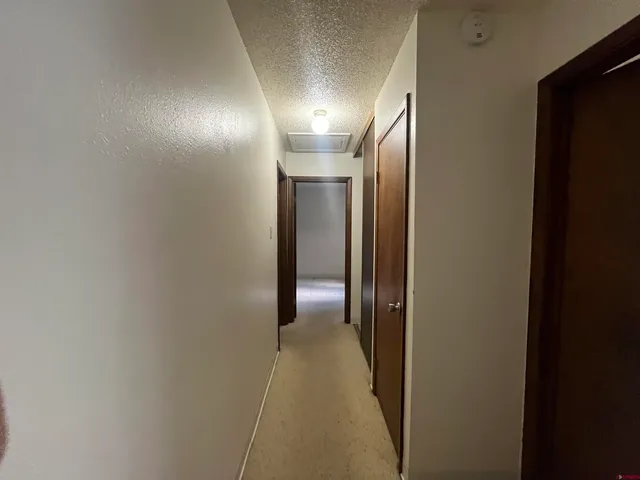 a view of a glass door and a yard