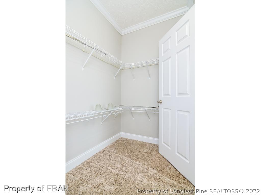 7347 Maxwell Road Stedman, NC 28391 - Photo 15 of 28 a view of a room with a hallway