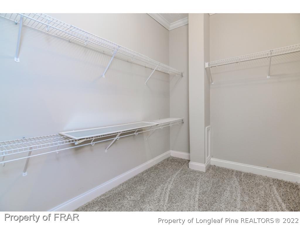 7347 Maxwell Road Stedman, NC 28391 - Photo 18 of 28 a view of an empty walk in closet