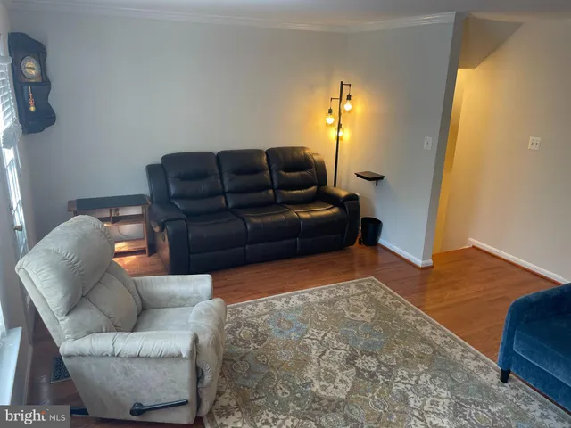 a living room with furniture and a couch
